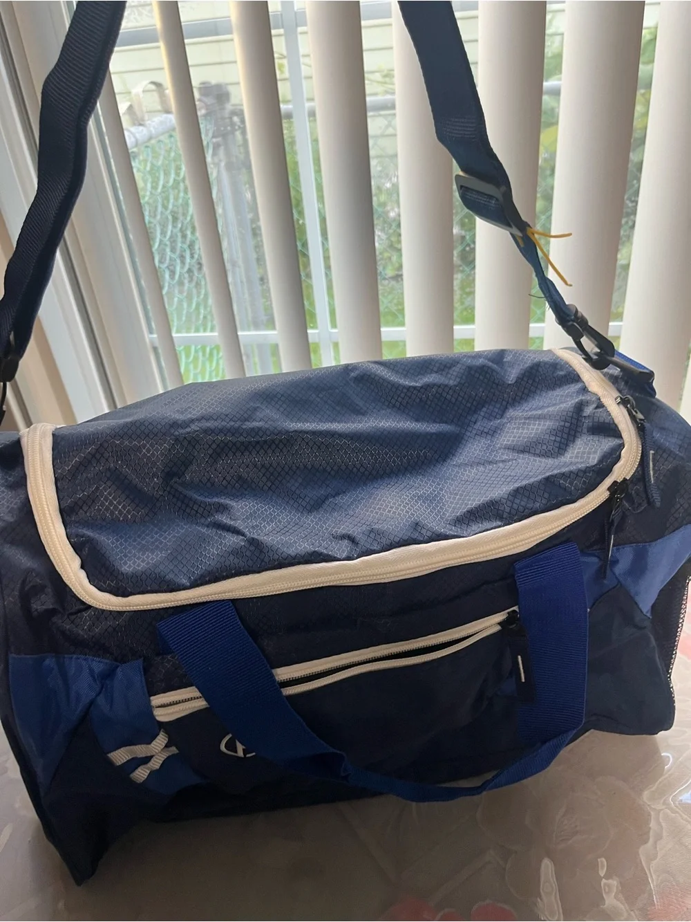 Men's Navy Blue Duffel Bag with White Trim and Dual Carry Handles